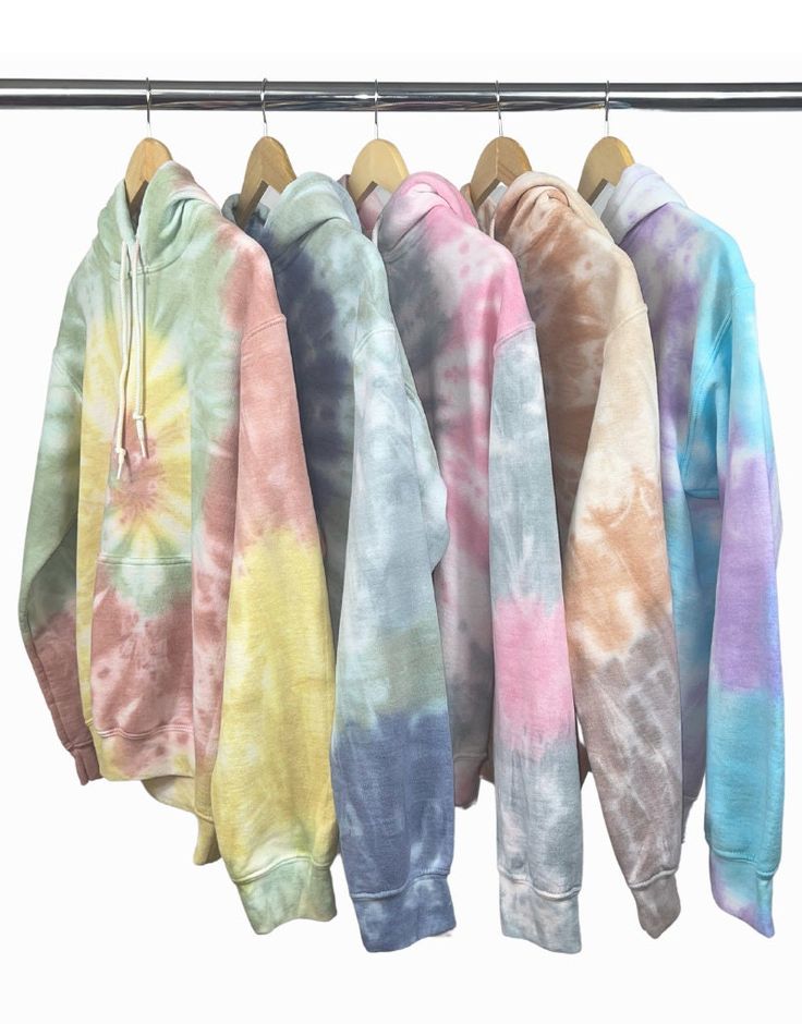 Introducing the Spiral Tie Dye Hoodie, the latest addition to our unique collection of Crafted Apparel. With its hand-crafted tie dye design, this hoodie is perfect for those who love to stand out from the crowd. Whether you prefer sublimation designs or heat transfer prints, our tie dye hoody provides the perfect blank canvas for your business or personal use. Crafted Apparel Co. is dedicated to providing high-quality fabrics that offer great value and comfort, all while maintaining unique style. Our Spiral Tie Dye Hoodie is available in 5 different colorways, including Autumn Leaves, Winter Solstice, Fairy Floss, Caramel Macchiato, and Ocean Breeze, ensuring you'll find the perfect match for your style. Enjoy even more savings on your next purchase with our exclusive wholesale pricing, a Spring Acid Wash Soft Hoodie, Spring Acid Wash Soft-washed Hoodie, Trendy Acid Wash Sweatshirt With Drawstring Hood, Acid Wash Hooded Hoodie For Spring, Spring Tie Dye Hoodie With Drawstring Hood, Trendy Acid Wash Hooded Hoodie, Trendy Tie Dye Hoodie For Fall, Trendy Tie Dye Long Sleeve Hoodie, Trendy Tie Dye Hooded Sweatshirt