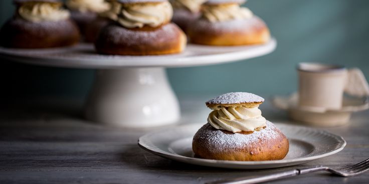 a plate topped with donuts covered in icing