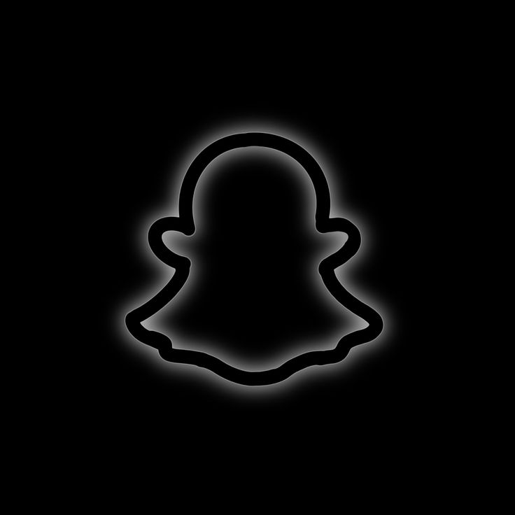 a black and white photo of a snapchat logo with the light shining on it