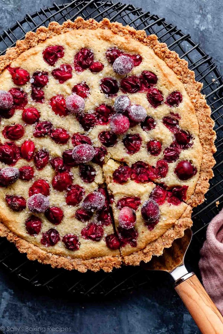 a pie on a cooling rack with one slice taken out