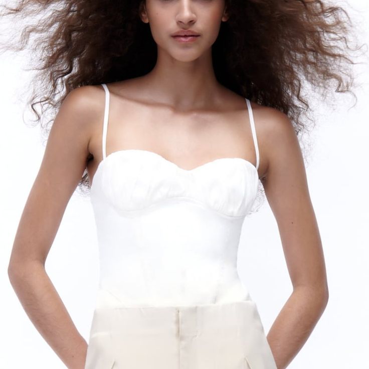 Zara Linen Blend Corset Bodysuit Size Xs S M Or L Nwt Color: White Style: 3067/108/712 Adjustable Spaghetti Straps Bottom Snap Button Closure Side Zipper Main Fabric: 42% Linen, 40% Viscose, 16% Polyamide, 2% Elastane Lining: 100% Polyester Imported Items Are Retail Store Purchases And May Have Been Handled Or Tried On By Store Customers Prior To Sending, Photos Are Taken Of Item With Shipping Label And A Zip Tie Tag Attached To Represent The Item Purchased And Shipped Chic Camisole With Lined Body And Spaghetti Straps, Spring Fitted Bodysuit With Built-in Bra, Chic Fitted Bodysuit With Spaghetti Straps, Elegant Cami Bodysuit With Adjustable Straps, Chic Spaghetti Strap Bodysuit, Summer Camisole With Lined Body And Spaghetti Straps, Summer Camisole With Spaghetti Straps And Lined Body, Spring Elegant Bodysuit With Spaghetti Straps, Elegant Spring Bodysuit With Spaghetti Straps