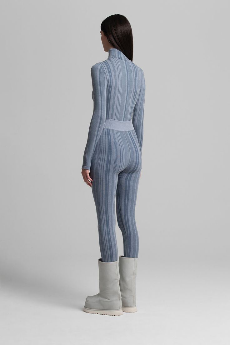 PRESALE: THIS STYLE SHIPS NOVEMBER 1 Textural vertical rib and shape wear construction complement physique while fitting flawlessly under ski suits. Top and bottom sold separately. Fitted Ribbed Elastane Activewear, Fitted Full Length Ribbed Activewear, Ribbed Fitted Athleisure Activewear, Ribbed Fitted Bottoms For Winter, Seamless Full-length Fitted Bottoms, Fitted Athleisure Unitard With Seamless Construction, Winter Ribbed High-stretch Activewear, Winter Ribbed High Stretch Activewear, Sporty Fitted Seamless Unitard