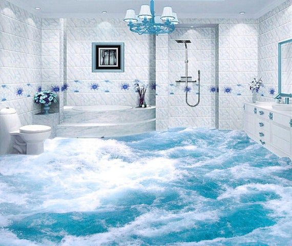 a bath room with a large tub and a chandelier hanging from the ceiling