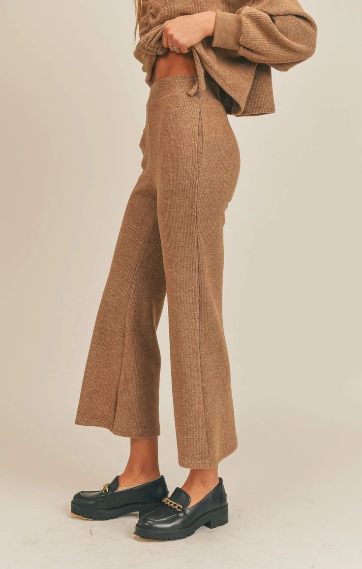 OuråÊA pair of comfy, yet flattering flare pants. Our Change Like Weather Pants come in a cozy brown ribbed knit and feature open side pockets. Pair them with the matching top and cardi.åÊ 79.5% POLYESTER 18% RAYON 2.5% SPANDEX ModelåÊis wearingåÊa size small.åÊ TheåÊmeasurements below areåÊa guide to determine what sizeåÊmay fit you best. Please note all conversions are approximate and may vary style by style.åÊ Outseam |åÊMeasure theåÊlength of youråÊwaist to feet. Bust |åÊMeasure under your a Elle Magazine, Shopping Spree, Matching Top, Staple Pieces, Flare Pants, Quality Clothing, The Label, Parachute Pants, Everyday Essentials Products