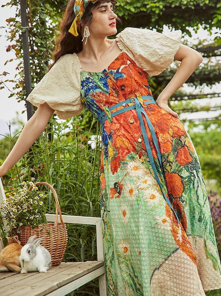 A dress featuring Van Gogh's "Daisy and Poppy in a Vase".





 <Size>



 small size






 Length: 104cm

 Shoulder width: 39cm

 Bust: 89.5cm

 Waist: 71cm

 Sleeve length: 34.5cm




 medium size



 Length: 107cm

 Shoulder width: 40cm

 Bust: 93.5cm

 Waist: 75cm

 Sleeve length: 35cm




 L size



 Length: 110cm

 Shoulder width: 41cm

 Bust: 97.5cm

 Waist: 79cm

 Sleeve length: 35.5cm









 <Material>



 polyester

 Viscose

 Nylon






 <model wearing>



 wearing size



 medi Summer Garden Party Puff Sleeve Maxi Dress, Fitted A-line Dress For Picnic, Summer Floral Print Puff Sleeve Dress With Square Neck, Floral Print A-line Dress For Picnic, Green Midi Dress With Fitted Bodice For Summer, Summer A-line Floral Dress For Garden Party, Summer A-line Dresses For Garden Party, Vintage Puff Sleeve Dress With Square Neck For Summer, Spring Floral Print Puff Sleeve Dress With Fitted Bodice