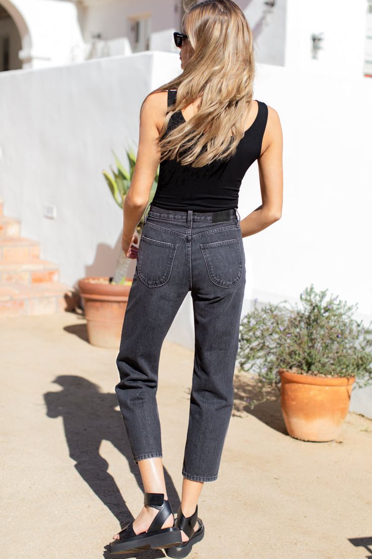 This essential and classic straight fit is inspired by your favorite vintage jean updated as a modern silhouette with our signature back pocket. It sits high and close on the body with a straight leg that finishes at the ankle elongating your legs. part of our Twin Doves denim collection Cotton Denim Zip fly with button closure Belt loops 5 pocket denim style Machine wash Made in LA Size 27: Rise 12", Inseam 27" Black Cropped Jeans With Straight Hem, Black Cropped Straight Hem Jeans With Five Pockets, Black Cropped Jeans With Five Pockets, Black Casual Cropped Jeans With Straight Hem, Classic Black Mid-rise Cropped Jeans, Black Relaxed Fit Cropped Jeans For Everyday, Straight Leg Cropped Jeans With Belt Loops For Fall, Relaxed Fit Straight Leg Cropped Jeans With Belt Loops, Washed Black Straight Leg Cropped Jeans For Fall