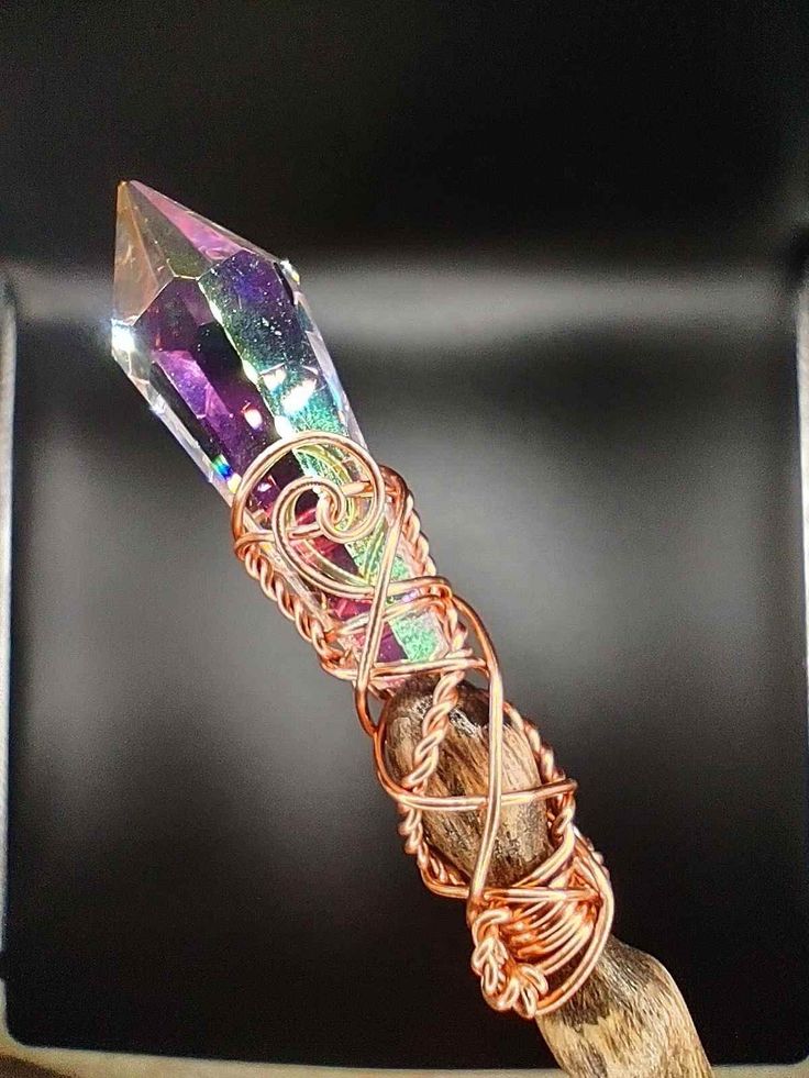 PRICES MAY VARY. WOOD: Oak (Light Brown Stain) FINISH: All natural Saman clear coat STONE: Egyptian Lead Crystal Glass (Sun-catcher) LENGTH: Around 10.5 inches (Smaller Hybrid Wand) WIDTH: Just shy of 3/8" METAL: Copper Wand Pouch included, made in the USA. WARNING: TV Magic is Fake. Real magick comes from the user, not the wand. INTENDED AGE: General Use 15 and older, and Adult This wand makes beautiful rainbows from the prism crystal when in the light. BE AWARE: These are small handheld wands, Sorcerer Wand, Witch Stick, Fairytale Bride, Business Ads, Witch Wand, Wizard Wand, Rainbow Prism, Healing Wands, Team Board