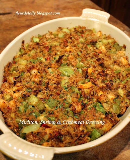 a casserole dish filled with stuffing and vegetables