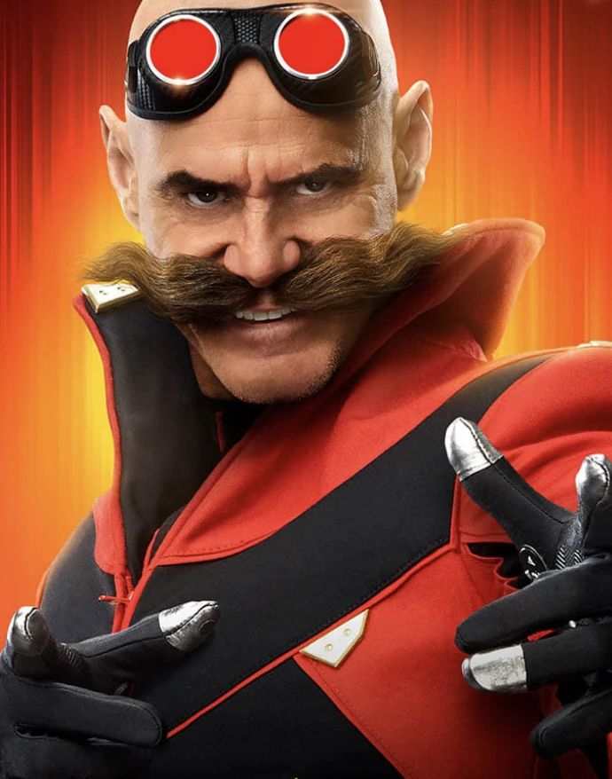 a man with a mustache and moustache wearing goggles