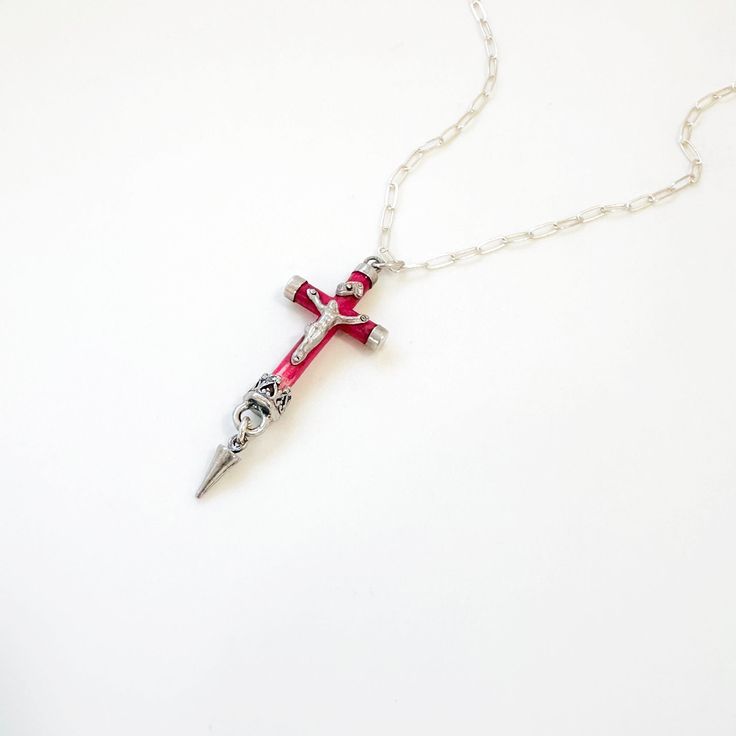 This truly unique and one of a kind and rare vintage cross necklace in coral and sterling silver makes an extra special piece of jewelry or gift for any Christian woman or girl. Inspired by John 3:16, "For God so loved the world that he gave his one and only Son, that whoever believes in him shall not perish but have eternal life." Features a crucifix style with a sterling silver Jesus on coral cross and all sterling silver details and components. A beautiful expression of faith for any Baptism, Confirmation, Christmas or religious gift.  Details: -Paper Clip Style Necklace: 16" (please let us know if you need adjustment or extender chain) -Lobster Clasp Closure -Cross: Approximately 1 1/2" long by 5/8" wide -Cross is a unique and rare vintage piece in sterling and coral details -We will s Red Sterling Silver Cross Necklace, Red Cross Necklace In Sterling Silver, Red Crucifix Cross Necklace Gift, Red Crucifix Cross Necklace For Gift, Red Cross Pendant Necklace Gift, Red Cross Pendant Necklace For Gift, Unique Sterling Silver Cross Necklace, Spiritual Crucifix Cross Necklace For Jewelry Making, Handmade Red Crucifix Jewelry