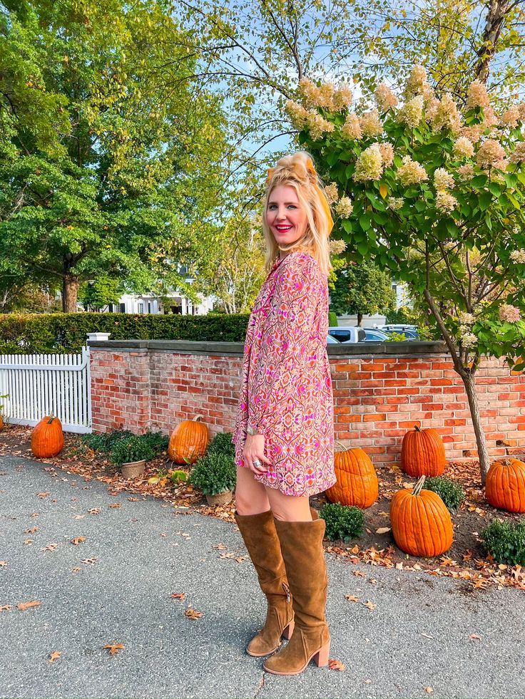 With its tan base adorned in a vibrant pink, orange, and tan abstract print, this flowy mini dress captures attention while offering ultimate comfort. The long sleeves and slight puff detail add a touch of sophistication, making it perfect for transitioning from day to night. Pair it with knee-high boots for a stylish autumn vibe at a pumpkin patch or slip into sleek mules for a chic dinner date under twinkling lights. PRODUCT FIT - TRUE TO SIZE MODEL DETAILS - CAROLINE IS WEARING A SIZE LARGE, Swimsuit Jewelry, Julie Vos, Flowy Mini Dress, Drinking Accessories, Twinkling Lights, Jeweled Earrings, Sneaker Slippers, Fall Fits, Dinner Date