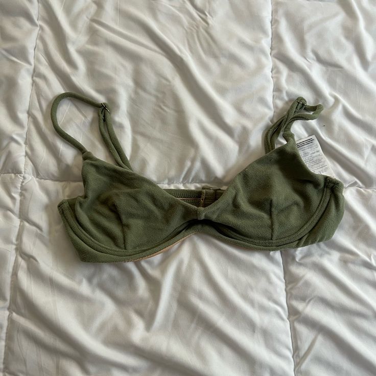 More A Sage Green In Person. Brand Nwot But The Cutest Fit And Has Underwire Support And Adjustable Straps On This Bikini Green Padded Beach Bra, Green Padded Cups Beach Bra, Green Beach Bra With Padded Cups, Green Seamless Bra For Beach, Seamless Green Bra For Beach, Beach Green Seamless Bra, Green Triangle Top Bra For Summer, Fitted Summer Bra With Adjustable Straps, Green Bra For Beach