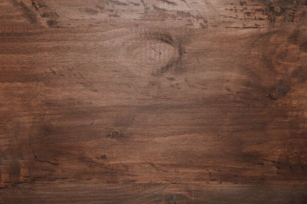 an image of wood textured with natural stain and grainy finish on it's surface