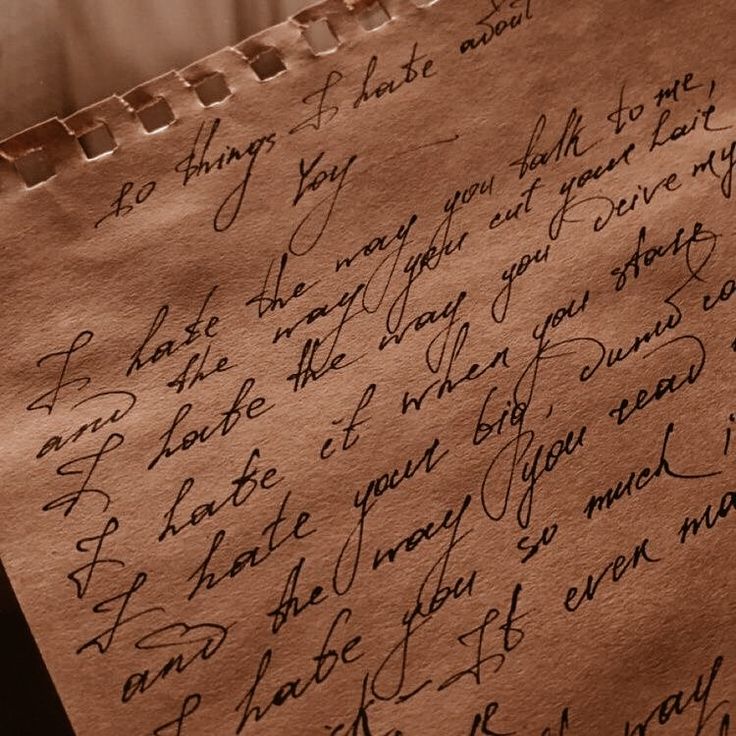 a piece of paper with writing on it that is written in cursive handwriting