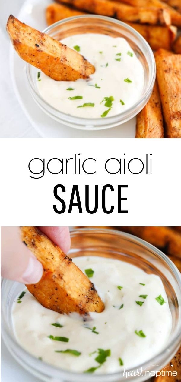 garlic aioli sauce in a small glass bowl with a hand dipping it into the dip