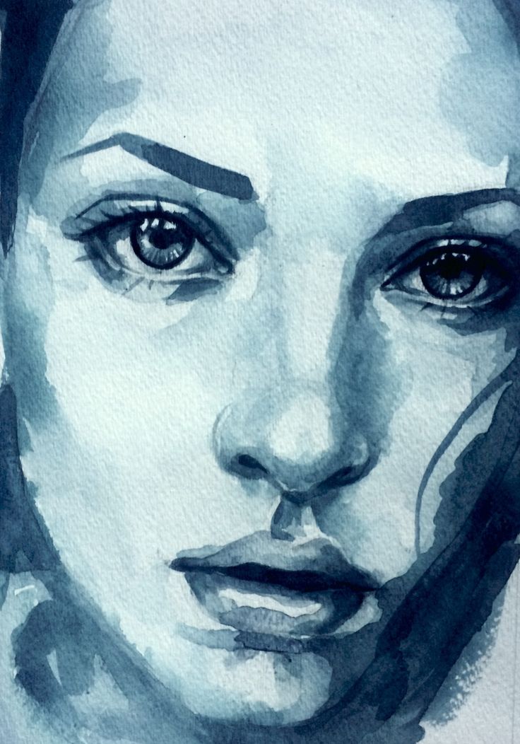 a watercolor painting of a woman's face