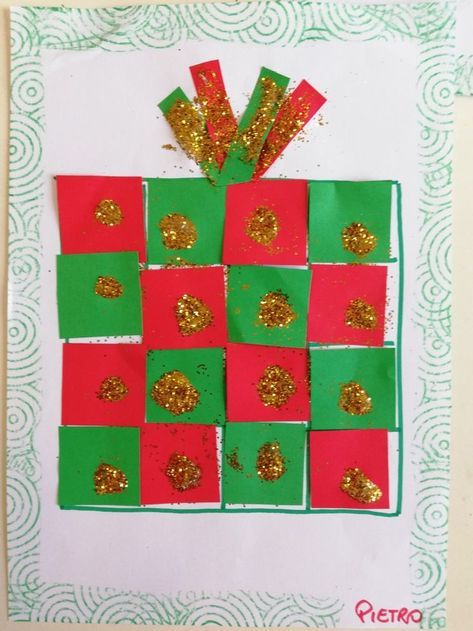 an art project made out of paper and gold glitters on top of green squares