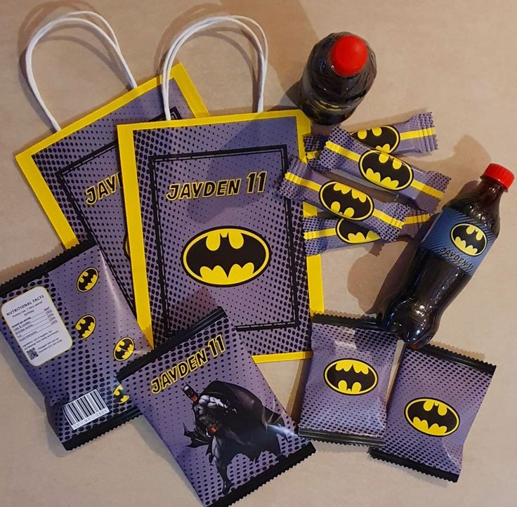 batman party favors and condiments are laid out on the table