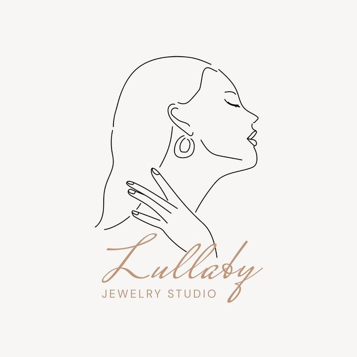 a woman's face with her hand on her shoulder and the words kullaby jewelry