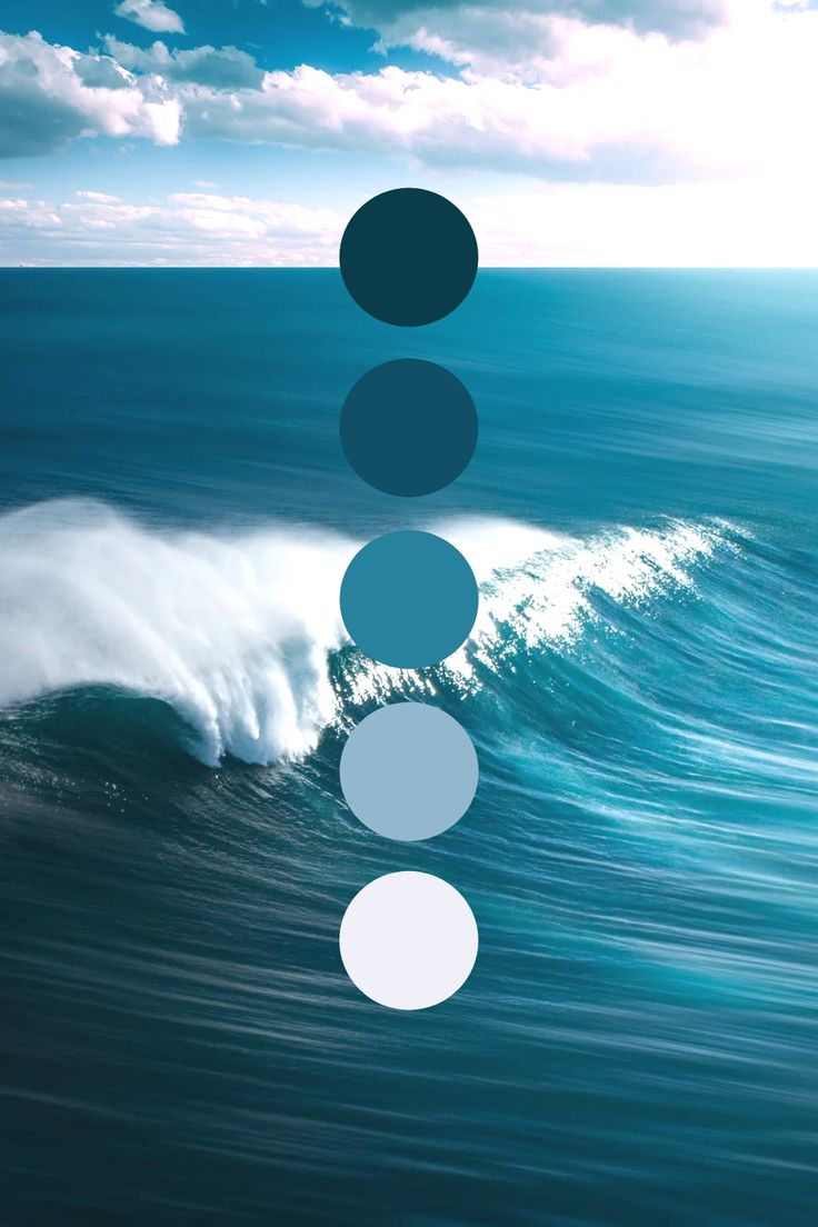 an ocean scene with three circles in the middle