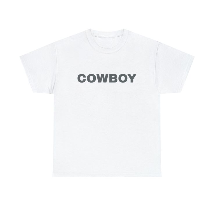 "Introducing our \"Cowboy\" t-shirt, a rugged and stylish addition to your wardrobe that captures the spirit of the Wild West. This t-shirt celebrates the timeless appeal of cowboy culture with its bold \"Cowboy\" print. Whether you're a true country enthusiast or simply admire the adventurous cowboy lifestyle, this tee is designed to make a statement. Made from comfortable and durable fabric, it's perfect for both casual outings and rodeo-ready looks. Embrace your inner cowboy or cowgirl and show off your love for all things Western with this classic \"Cowboy\" t-shirt. Saddle up and make it your go-to choice for a touch of frontier flair in your everyday style! The unisex heavy cotton tee is the basic staple of any wardrobe. It is the foundation upon which casual fashion grows. All it ne White Western T-shirt For Rodeo, White Letter Print Top For Rodeo, White Crew Neck Tops For Western-themed Events, White Graphic Tee For Western-themed Events, Western Style Cotton T-shirt For Rodeo, White Graphic Print T-shirt For Western-themed Events, White Crew Neck T-shirt For Rodeo, White Short Sleeve T-shirt For Rodeo, Trendy Crew Neck T-shirt For Ranch