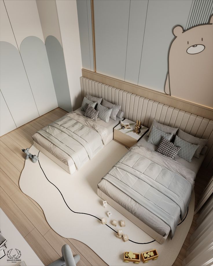 two beds with white sheets and pillows in a room that looks like it has a bear on the wall