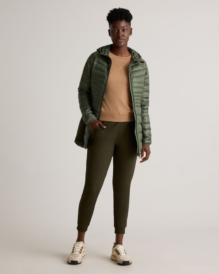 Currently on the need-now list: our Lightweight Down Packable Long Puffer Jacket. It looks good anytime casual is in order and is super versatile for outdoor adventures. With stretchy fleece side panels for effortless flex, convenient two-way zippers, and a water-repellent and wind-resistant fabric, this jacket is designed to keep you comfy and warm in a bunch of weather conditions. Plus, it's easily packable for on-the-go.  | Quince | Women's Lightweight Down Packable Long Puffer Jacket in Lode Functional Green Puffer Jacket For Fall, Casual Puffer Jacket In Recycled Polyester, Casual Recycled Polyester Long Sleeve Puffer Jacket, Casual Puffer Jacket With Recycled Polyester, Casual Long Sleeve Puffer Jacket In Recycled Polyester, Versatile Puffer Outerwear For Outdoor, Casual Recycled Polyester Winter Outerwear, Versatile Hooded Outerwear For Outdoor Activities, Versatile Recycled Polyester Outerwear For Outdoor Activities