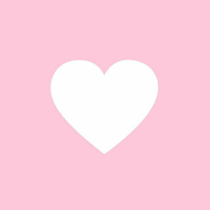 a white heart on a pink background