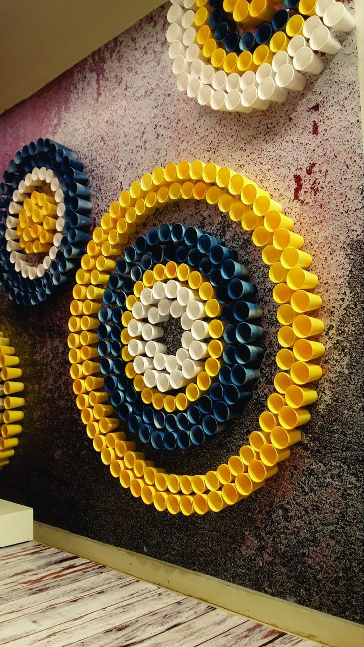 three circles made out of legos on the wall