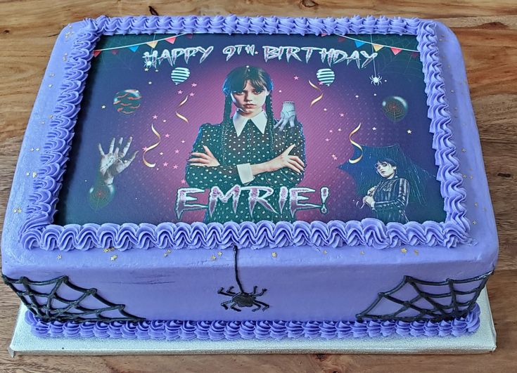 a birthday cake with an image of the character emrie on it