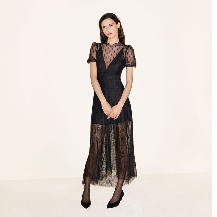 Worn Once All-Over Black Lace Midi Dress With Short Puff Sleeves. Round Neck And Fitted Waist With A Flared Skirt. Semi-Sheer With A Partial Slip Lining. Concealed Zip Fastening At Side. 90% Nylon, 10% Viscose; 100% Nylon; 48% Acetate, 32% Viscose, 20% Cotton Cocktail Maxi Dress With Lace Trim, Short Sleeve Midi Dress With Lace Trim For Party, Short Sleeve Midi Dress With Lace Trim For Evening, Sheer Short Sleeve Evening Midi Dress, Evening Sheer Short Sleeve Midi Dress, Evening Midi Dress With Lace Trim And Short Sleeves, Short Sleeve Sheer Midi Evening Dress, Cocktail Short Sleeve Dress With Lace Trim, Short Sleeve Cocktail Dress With Lace Trim