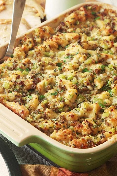 a casserole dish with bread and vegetables in it