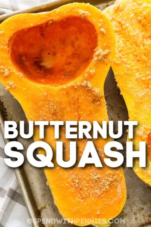 butternut squash on a baking sheet with the words butternut squash in front of it