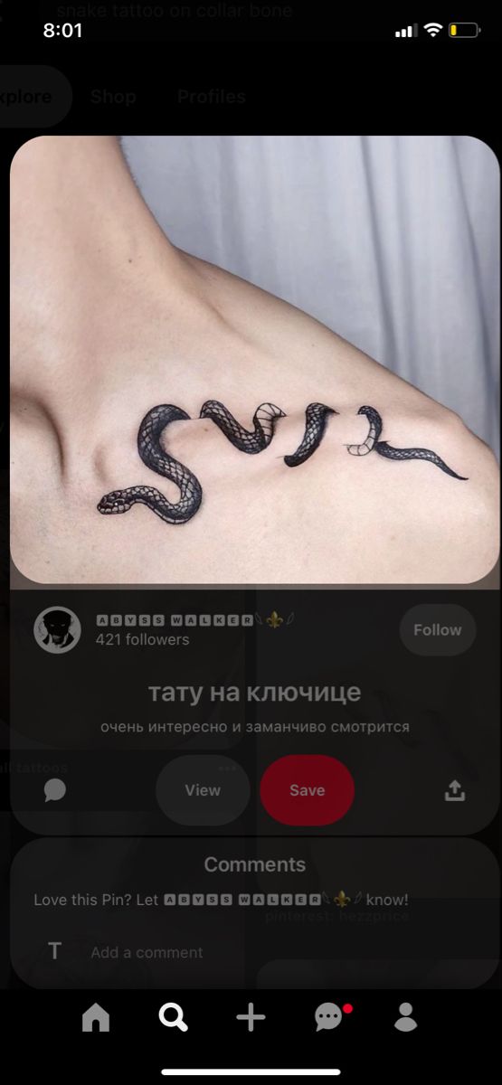 an image of a snake tattoo on someone's chest