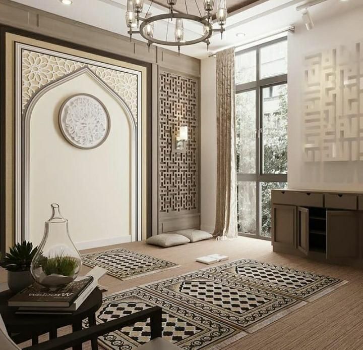 a living room filled with furniture and a chandelier