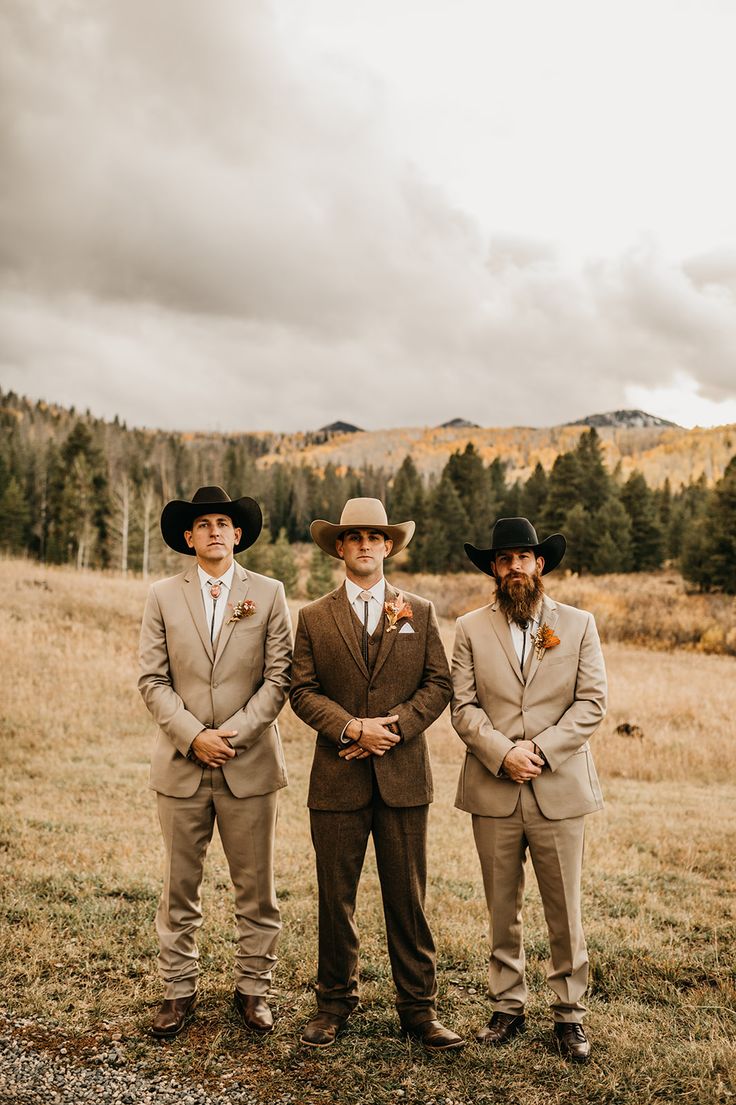 Intimate Fall Colorado Wedding at the Midnight Ranch Groom Cowboy Boots Wedding, Fall Wedding Brown Suit, Earth Tone Groomsmen Attire, Western Fall Wedding Groomsmen, Fall Father Of The Bride Attire, Brown Suit Wedding Groomsmen, Dark Tan Groomsmen Suits, Western Ranch Wedding, Modern Cowboy Wedding