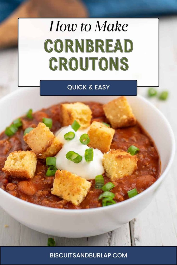 a white bowl filled with cornbread croutons and topped with sour cream