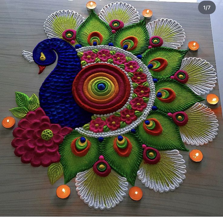 this is an image of a peacock made out of paper with candles on the table