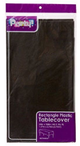 a package of black plastic tablecover with purple lettering on the front and bottom