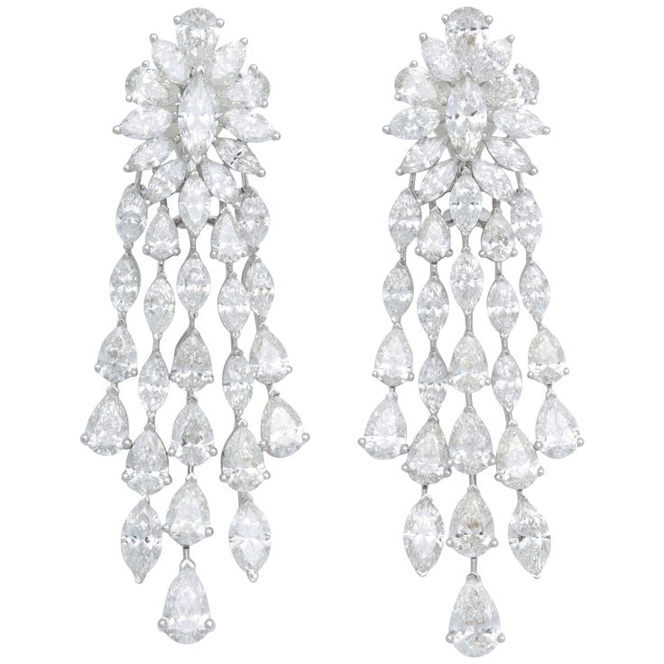 A GRAND pair of diamond earrings! 36.41 carats of marquise and pear shape diamonds set in 18k white gold. These earrings are crafted with mainly large diamonds, around a carat size and 3/4 carats. They average half a carat each. Just under 3 inches in length, approximately an inch at its widest point. An incredible statement piece. Chandelier Earrings Wedding, Gold Diamond Studs, Swirl Earrings, Traditional Earrings, Diamond Dangle Earrings, White Gold Earrings, Diamond Drops, Pear Shaped Diamond, Diamond Drop Earrings