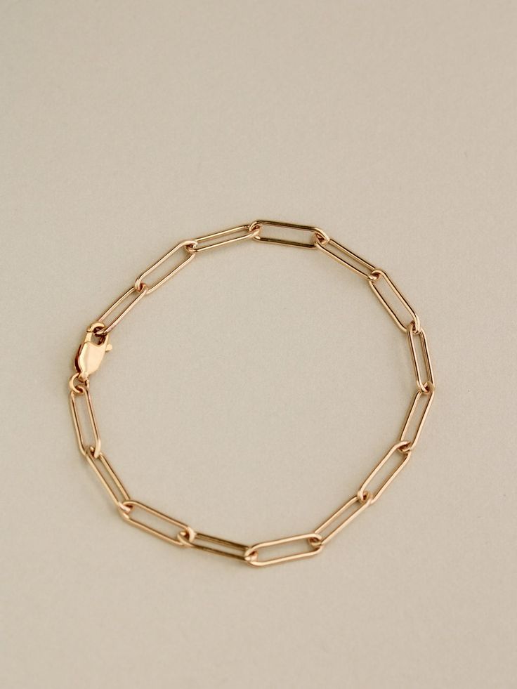 Formal Chain Link Bracelet With Hook And Links, Modern Rose Gold Oval Link Chain Bracelet, Oval Link Paperclip Bracelet As Gift, Timeless Chunky Chain Bracelet For Everyday, Timeless Everyday Chunky Chain Bracelet, Gold Chain Link Paperclip Bracelet, Paperclip Chain Link Bracelet, Modern Chunky Chain Paperclip Bracelet, Formal Link Paperclip Bracelet With Lobster Clasp