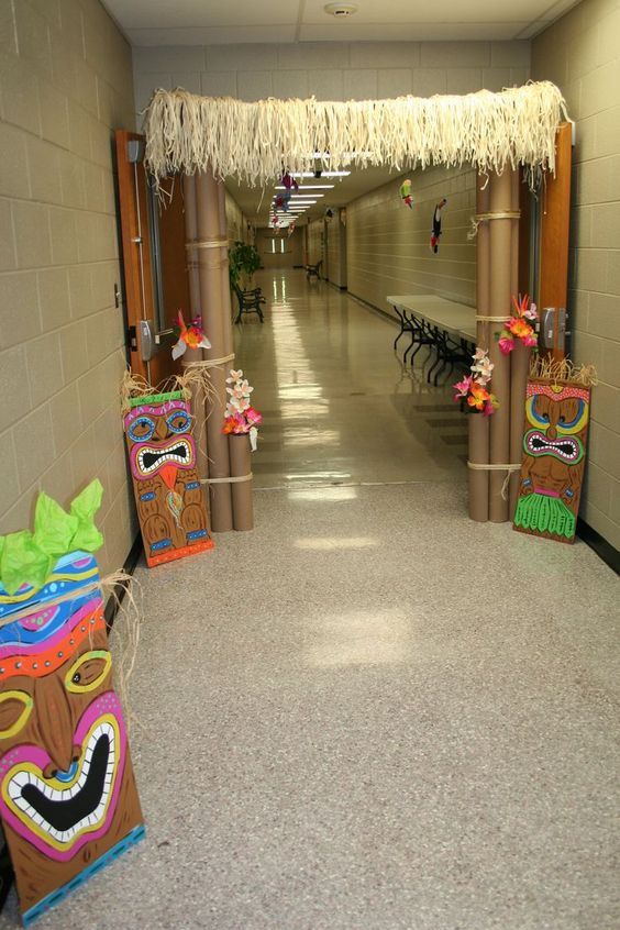 a hallway decorated with tiki masks and decorations