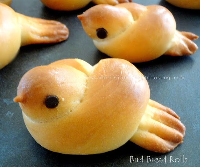 some bread shaped like animals sitting on a table