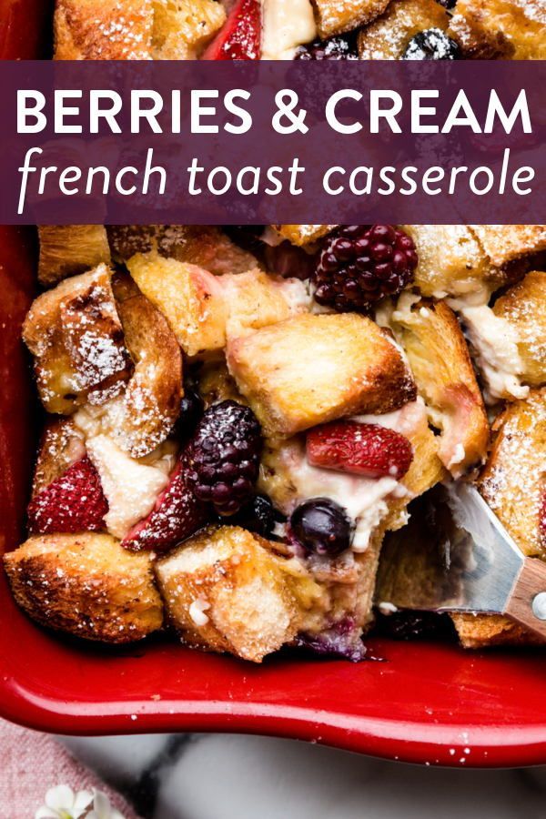 berries and cream french toast casserole in a red dish