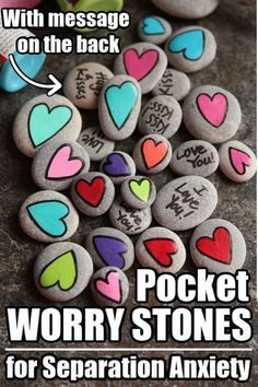 some rocks with hearts on them and the words worry stones for separation anxiey