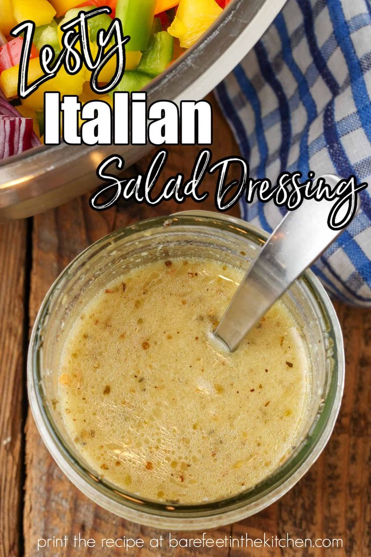 a jar filled with salad dressing next to a bowl full of vegetables and the words, easy italian salad dressing