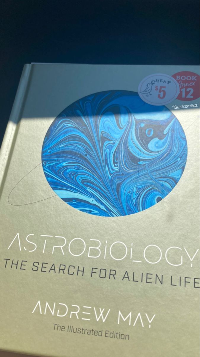 the book astrobiology is sitting on a table