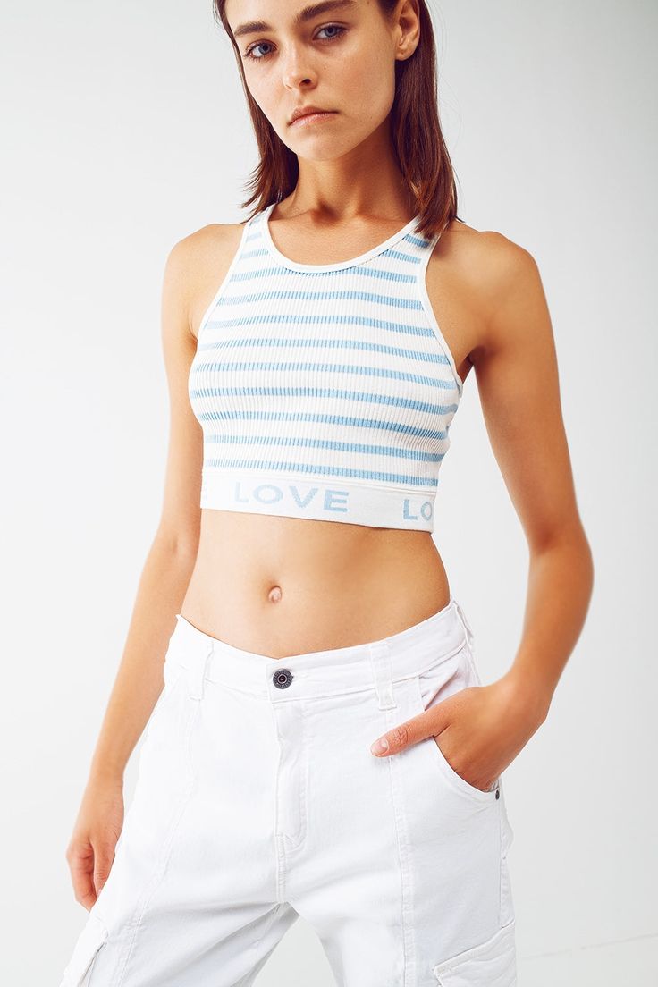 Introducing our Striped Cropped Top with Love Text in Blue, a trendy and stylish addition to your summer wardrobe. This top combines a cropped length, a playful stripe design, and a touch of love to create a chic and eye-catching look. Designed in a cropped length, this top sits perfectly at the waistline, allowing you to show off your favorite high-waisted bottoms or create a flirty and fashionable ensemble. The stripe design adds a touch of classic style, while the contrast collar adds a subtl Love Text, Running Tops, Comfortable Tops, Contrast Collar, Striped Tank Top, Crop Top, Belted Dress, Stripes Design, High Waisted Pants