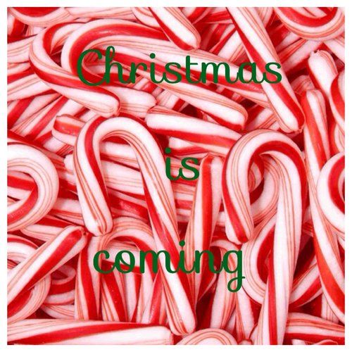 a red candy cane surrounded by silver and white spirals with the letter s on it