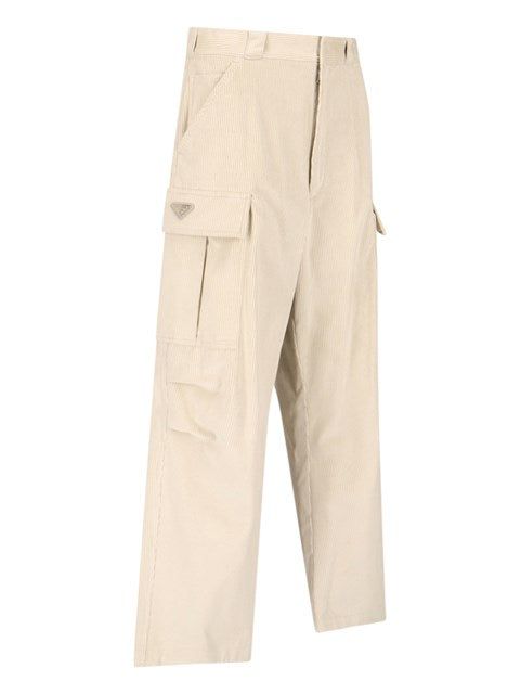 PRADA VELVET, BEIGE CARGO PANTS, WITH BELT LOOPS, HOOK-AND-EYE AND ZIPPER CLOSURE, TWO FRONT POCKETS, TWO SIDE CARGO PATCH POCKETS, TWO BACK POCKETS, AN ENAMELED TRIANGLE LOGO DETAIL ON THE SIDE, AND A LOOSE LEG. Size Type: STANDARDSKU: SPH286 222 1RL7F0K74-1 Our Products Are 100% Genuine. In All Cases We Stand By The Authenticity Of Every Product Sold On Our Site. Casual Beige Cargo Pants With Welt Pockets, Beige Full Length Work Pants With Pockets, Beige Bottoms With Patch Pockets For Streetwear, Utility Style Beige Bottoms With Welt Pockets, Cream Pants With Pockets For Streetwear, Luxury Beige Straight Cargo Pants, Beige Streetwear Pants With Patch Pockets, Luxury Beige Cargo Pants With Pockets, Velvet Cargo Pants